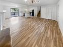 Open concept living room features hardwood floors and an island kitchen at 5351 Zachary Dr, Stone Mountain, GA 30083