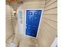 Inviting front door entrance with light colored siding at 309 Quail Run, Roswell, GA 30076