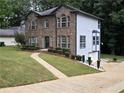 Two-story house with brick and white siding at 4329 Wesley Way, Decatur, GA 30034