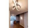 Modern apartment hallway with unique light fixtures at 400 W Peachtree Nw St # 2314, Atlanta, GA 30308