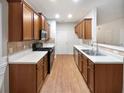 Efficient kitchen with ample cabinetry and a center island at 709 Celeste Sw Ln, Atlanta, GA 30331