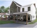 Modern farmhouse style home with large windows and a covered patio at 474 Eastland Dr, Decatur, GA 30030