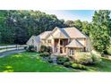 Beautiful two story house with manicured landscaping at 2269 E Cherokee Dr, Woodstock, GA 30188
