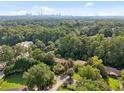 Aerial view showing home's location and city skyline at 1272 Breezy Ne Ln, Atlanta, GA 30329