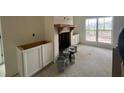 Living room with a fireplace and built in cabinets at 569 Winndale Rd, Dallas, GA 30157