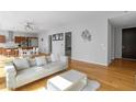Open living area with hardwood floors and access to a balcony at 45 Ivan Allen Jr. Nw Blvd # 2501, Atlanta, GA 30308