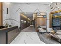 Elegant lobby with marble floors and modern seating at 3107 Peachtree Ne Rd # 1101, Atlanta, GA 30305