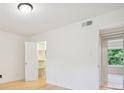 Bright bedroom with ample closet space and hardwood floors at 1261 Lavista Rd # F-3, Atlanta, GA 30324