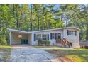 Charming ranch home with a covered carport and landscaped yard at 772 Jefferson Sw Ave, Atlanta, GA 30315