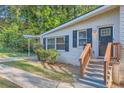 Charming ranch home with a covered carport and landscaped yard at 772 Jefferson Sw Ave, Atlanta, GA 30315