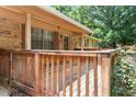 Wooden deck overlooks backyard, offering peaceful views at 4763 Old Briar Trl, Douglasville, GA 30135