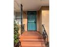 Front door with security door and porch at 2164 Mark Trl, Decatur, GA 30032