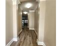 Bright and spacious entryway with hardwood floors and neutral walls at 4024 Towne Creek Cv, Duluth, GA 30097