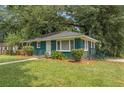 Charming ranch home with green exterior at 1215 Richland Sw Rd, Atlanta, GA 30310