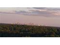 Stunning panoramic view of the city skyline at sunset at 3300 Windy Ridge Se Pkwy # 1110, Atlanta, GA 30339