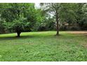 Large grassy lot, ready for new construction at 3061 Sandy Plains Rd, Marietta, GA 30066