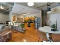 Modern kitchen with stainless steel appliances and wood cabinets at 115 W Peachtree Nw Pl # 301, Atlanta, GA 30313