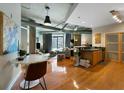 Open concept living area with hardwood floors and a modern kitchen at 115 W Peachtree Nw Pl # 301, Atlanta, GA 30313