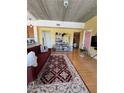 Bright living room with hardwood floors and eclectic decor at 563 Se Memorial Se Dr # 401, Atlanta, GA 30312