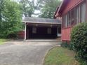 Covered carport attached to the side of the house at 3090 Trickum Rd, Marietta, GA 30066