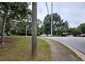 Residential street view showing neighborhood and road conditions at 3090 Trickum Rd, Marietta, GA 30066
