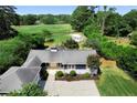 House with a large backyard backing up to a golf course at 3573 Clubhouse Ln, Conyers, GA 30094