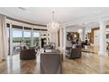 Spacious living room with large windows and city views at 3286 Northside Nw Pkwy # 1005, Atlanta, GA 30327