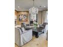 Sitting area with gray armchairs and a black coffee table at 3286 Northside Nw Pkwy # 1005, Atlanta, GA 30327