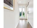 Bright and airy entryway with hardwood floors and barn door at 2029 Memorial Dr # 33, Atlanta, GA 30317