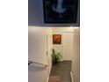 Bright and airy stairwell with artwork and plants at 405 Aristocrat Dr, Loganville, GA 30052