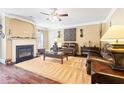 Living room features hardwood floors, fireplace and plenty of natural light at 4079 Dinmont Chase, South Fulton, GA 30349