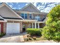 Brick front of townhouse with landscaping at 1798 Willow Branch Nw Ln # F, Kennesaw, GA 30152