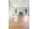 Bright living room with hardwood floors and fireplace at 1116 Fieldstone Dr, Canton, GA 30114