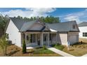 Craftsman style home with gray roof and brick accents at 3378 Chosen Blvd, Snellville, GA 30078