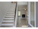 Bright entryway with staircase and view of living room at 25 Homesite Cooper E Cv, Fayetteville, GA 30215