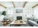 Living room with fireplace and built-in shelving at 1277 Avalon Ne Pl, Atlanta, GA 30306