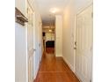 Bright entryway with hardwood floors and doors leading to other rooms at 2986 Ashlyn Pointe Dr, Atlanta, GA 30340