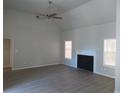 Spacious living room with a fireplace and high ceilings at 3475 Washington Rd, Atlanta, GA 30344