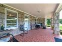 Spacious front porch with stone details at 3112 Highway 155 N, Mcdonough, GA 30252