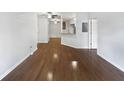 Spacious living area featuring hardwood floors and lots of natural light at 200 Renaissance Ne Pkwy # 302, Atlanta, GA 30308