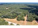 21.04 acres of wooded land near Big Cotton Indian Creek at 3154 Highway 155 N, Mcdonough, GA 30252