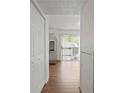 Hallway with sliding glass door leading to patio at 6584 Sleepy Hollow Ln, Morrow, GA 30260