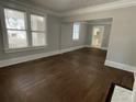 Spacious living room with hardwood floors and fireplace at 916 Cascade Sw Rd, Atlanta, GA 30311