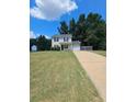 Two-story house with a well-maintained lawn and driveway at 500 Mica Trce, South Fulton, GA 30349