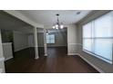 Bright dining area with hardwood floors and window at 3008 Summer Breeze Dr, Villa Rica, GA 30180