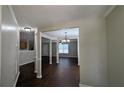 Dining room with dark hardwood floors and chandelier at 3008 Summer Breeze Dr, Villa Rica, GA 30180