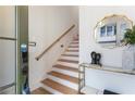 Bright entryway with staircase, console table, and mirror at 697 Eustace Se St, Atlanta, GA 30315