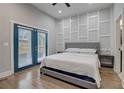 Main bedroom with large bed and french doors at 975 Welch Sw St, Atlanta, GA 30310