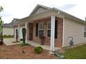 Brick and siding ranch house with a covered porch at 1007 Sycamore Ln, Villa Rica, GA 30180