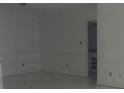Bright living room with new white flooring and fresh paint at 2968 Parc Lorraine, Lithonia, GA 30038